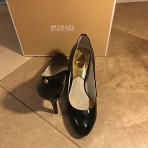 Black patent leather Michael Kors pumps